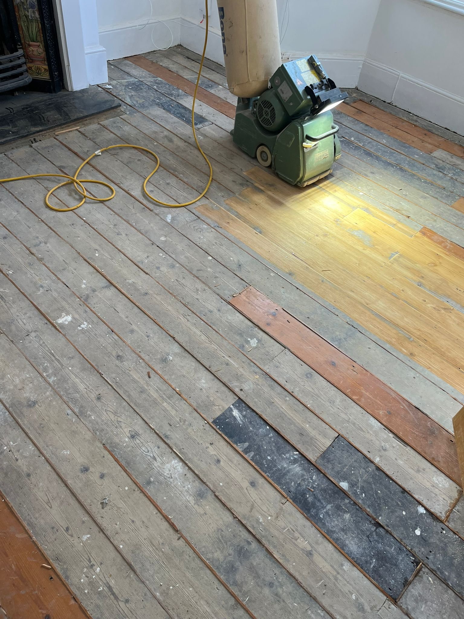 Floorboard sanding in progress, London