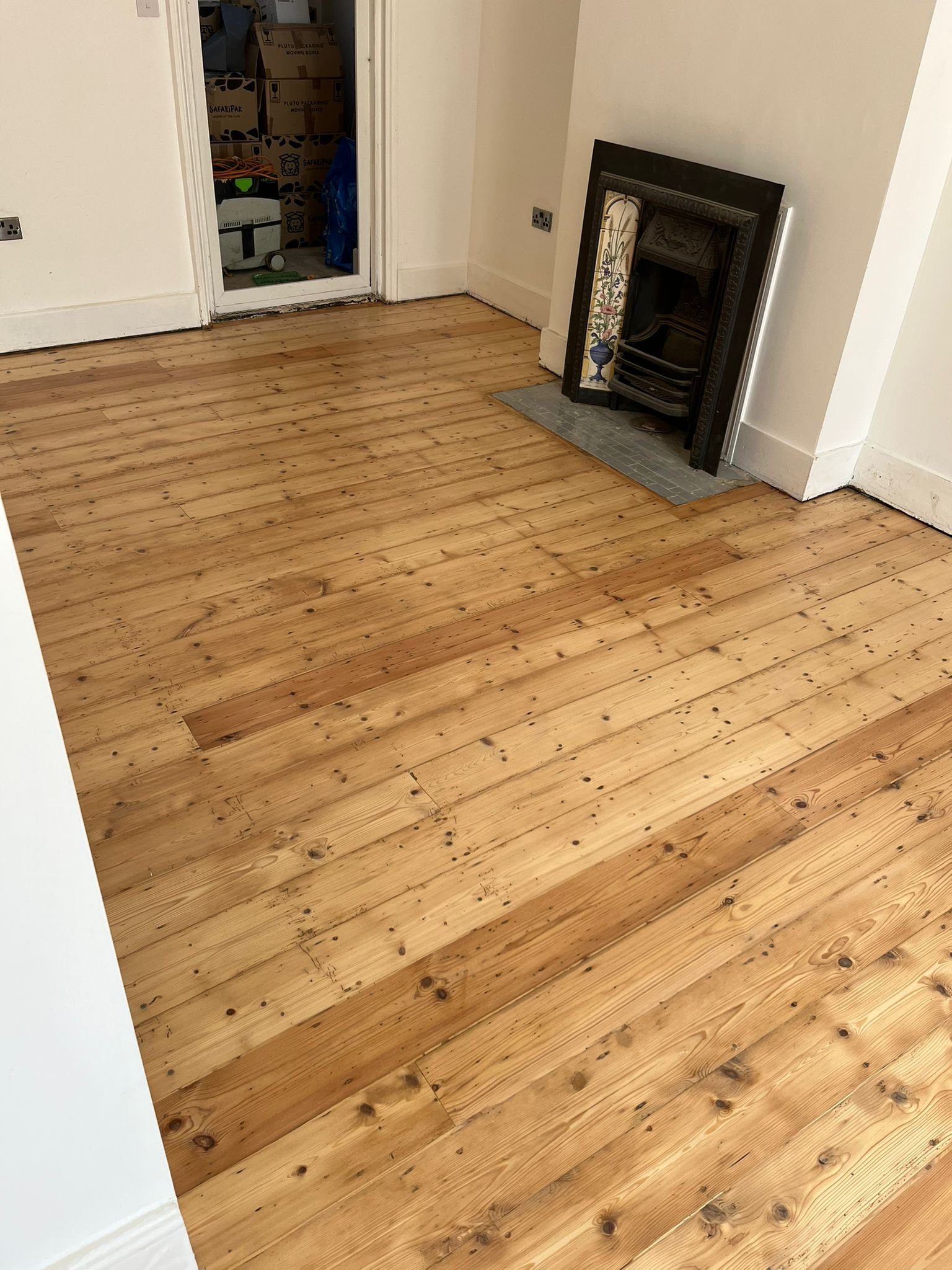 Pine floorboards restored and sealed