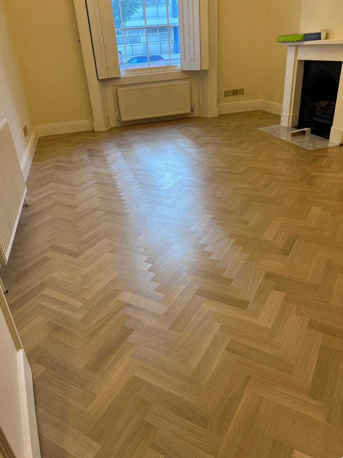 Whitewashed oak herringbone restoration