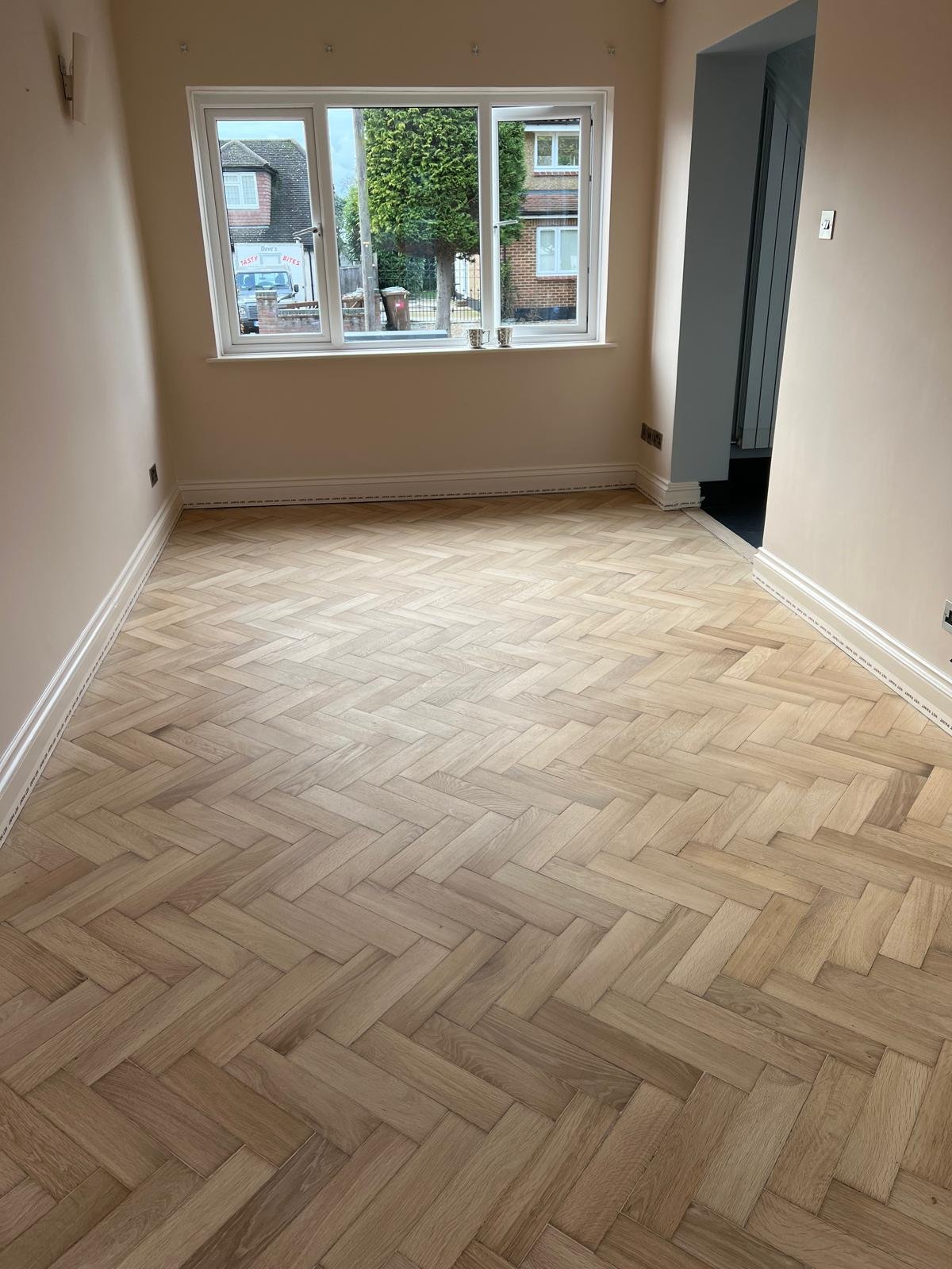 Light oak herringbone floor fitting