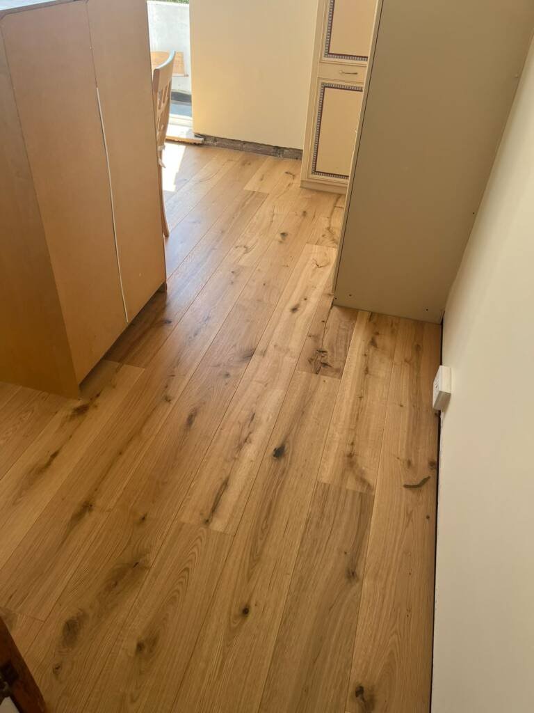 Oak boards fitted along a hallway