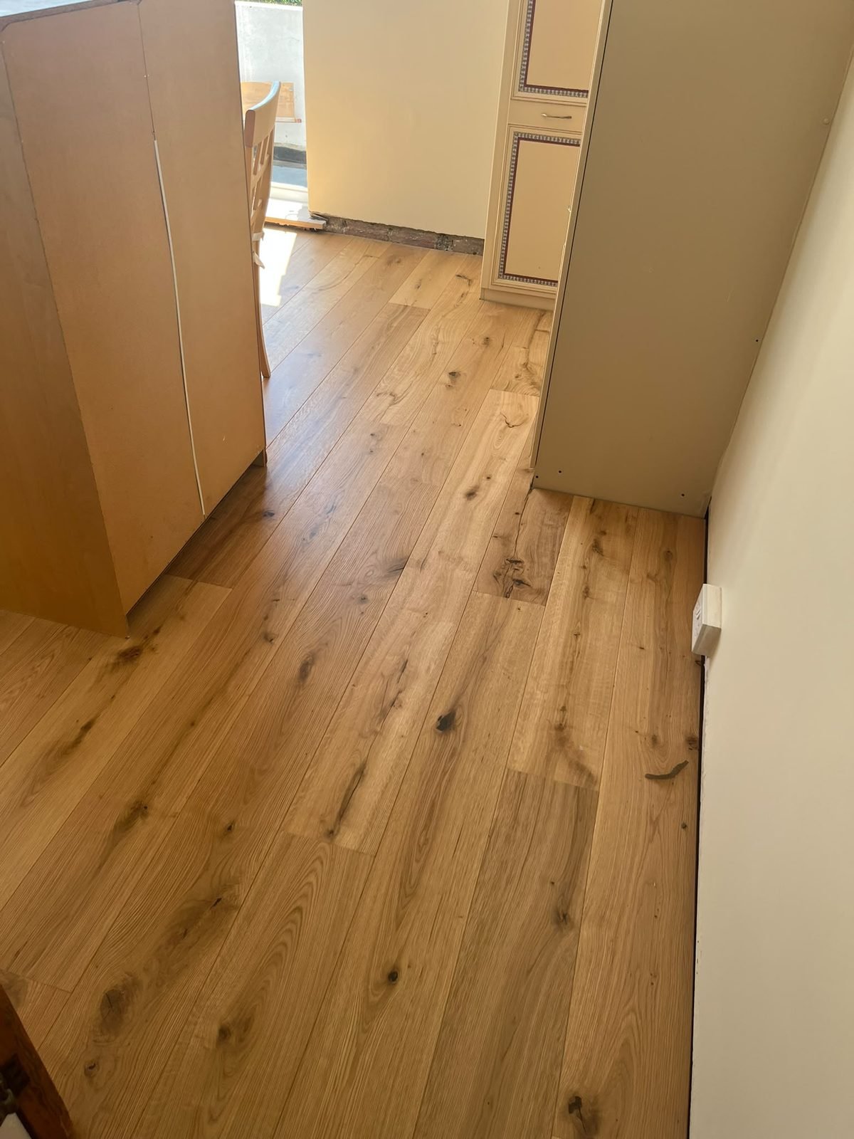 Oak floor fitted in a hallway
