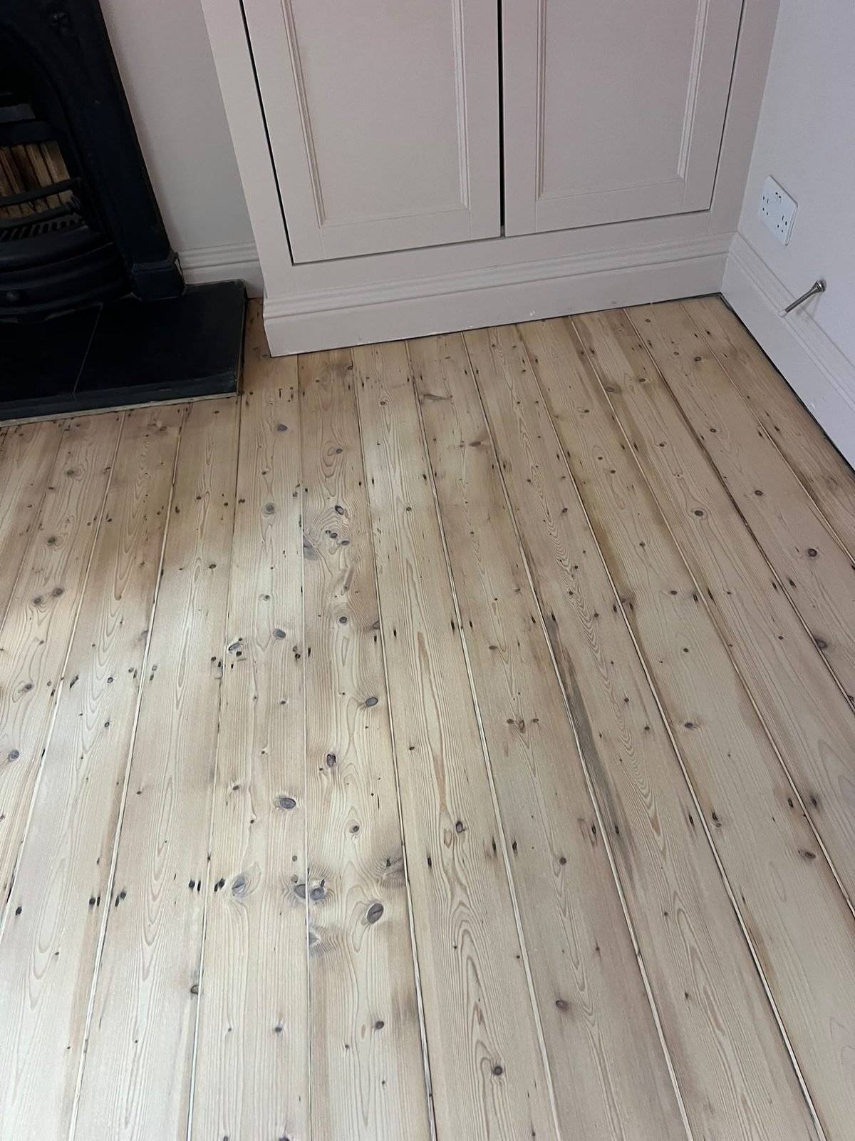 Pine floor restored with original fireplace