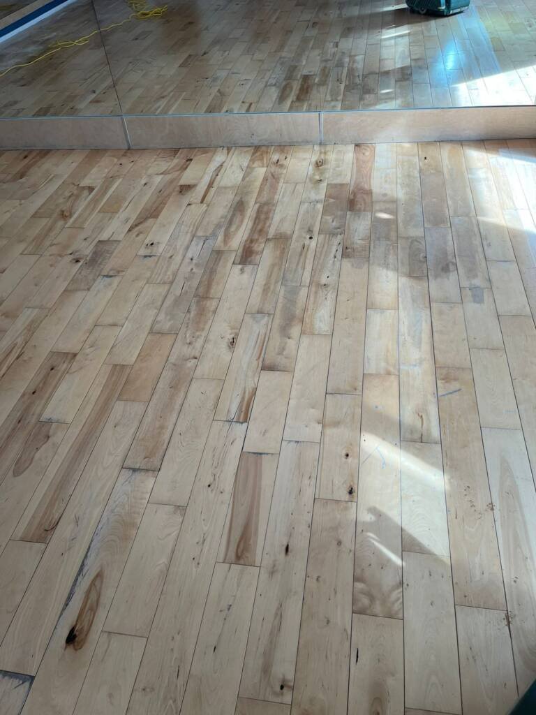 Pine floorboards sanded back and finished in a natural tone